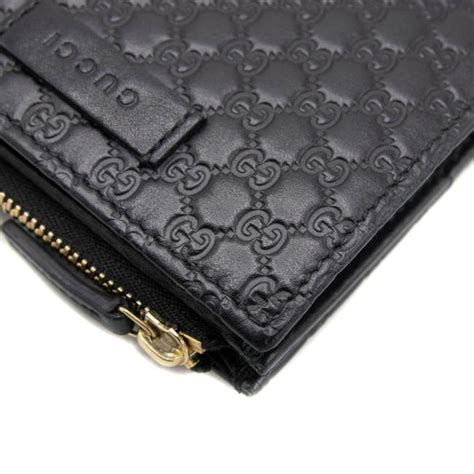 gucci bifold wallet microguccissima black